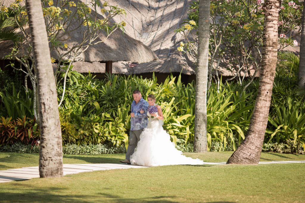 Wedding at The Patra Bali.  Father & Bride walked to the ceremony
