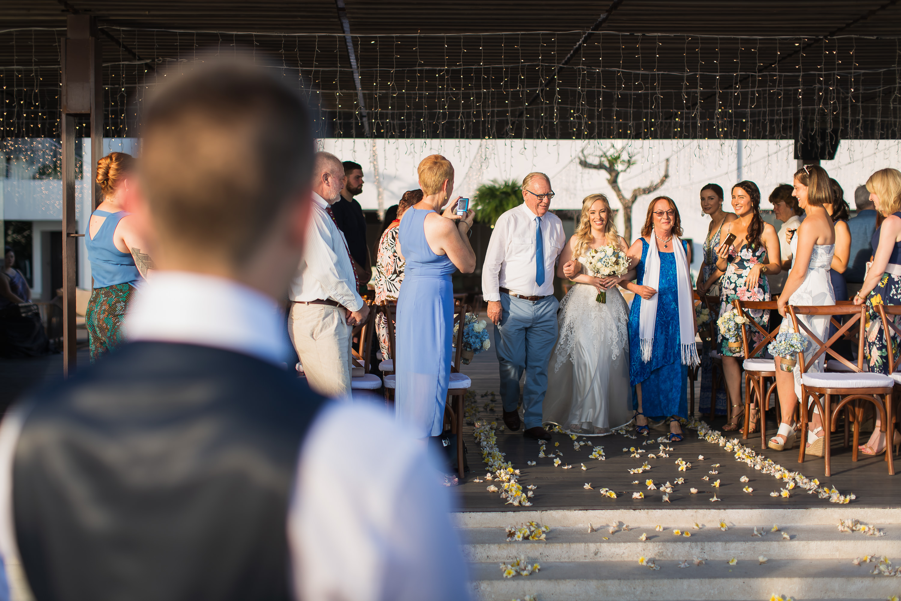 Alila Seminyak Wedding - Bride walking down the aisle