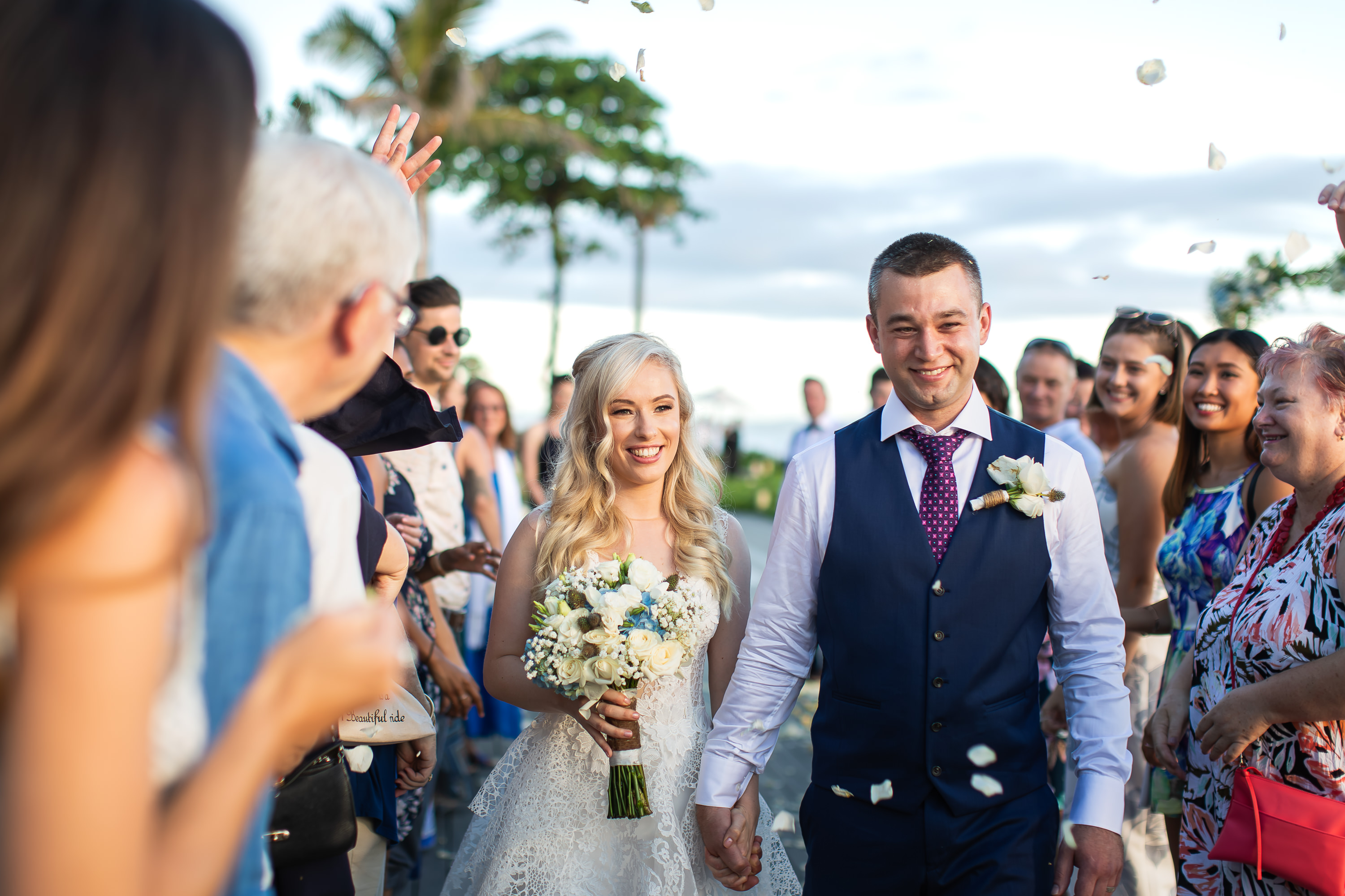Alila Seminyak Wedding - Wedding exit with guests