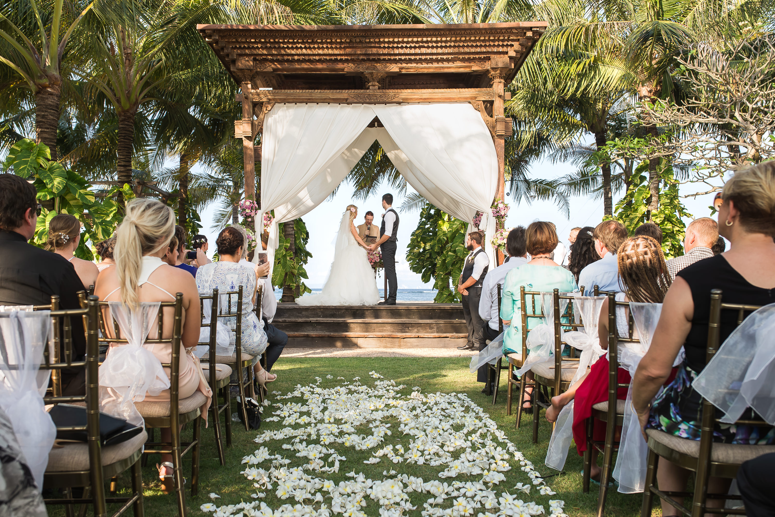 Taman Bhagawan Wedding - Beachfront garden wedding aisle