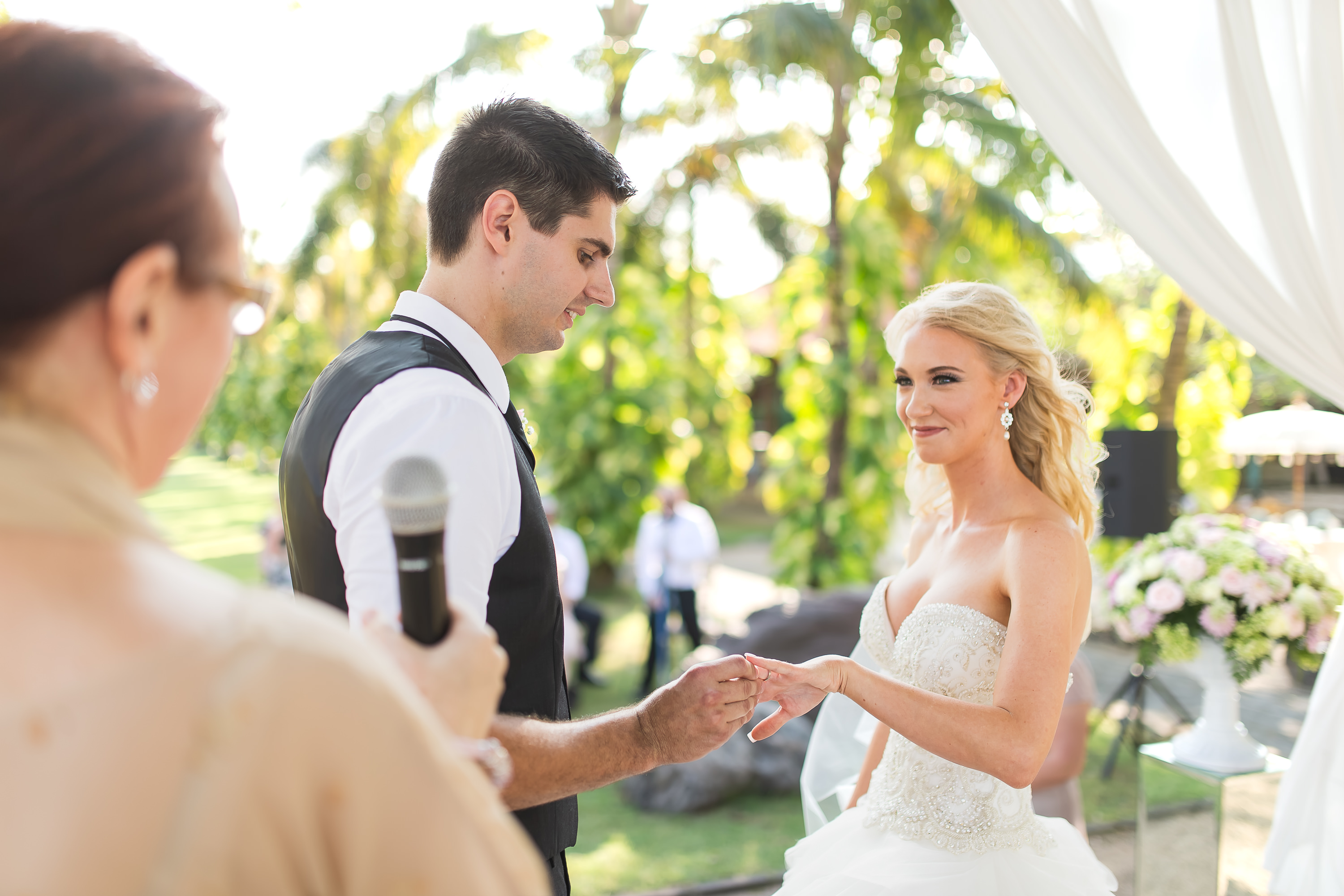 Taman Bhagawan Wedding - Bride and groom exchanging rings
