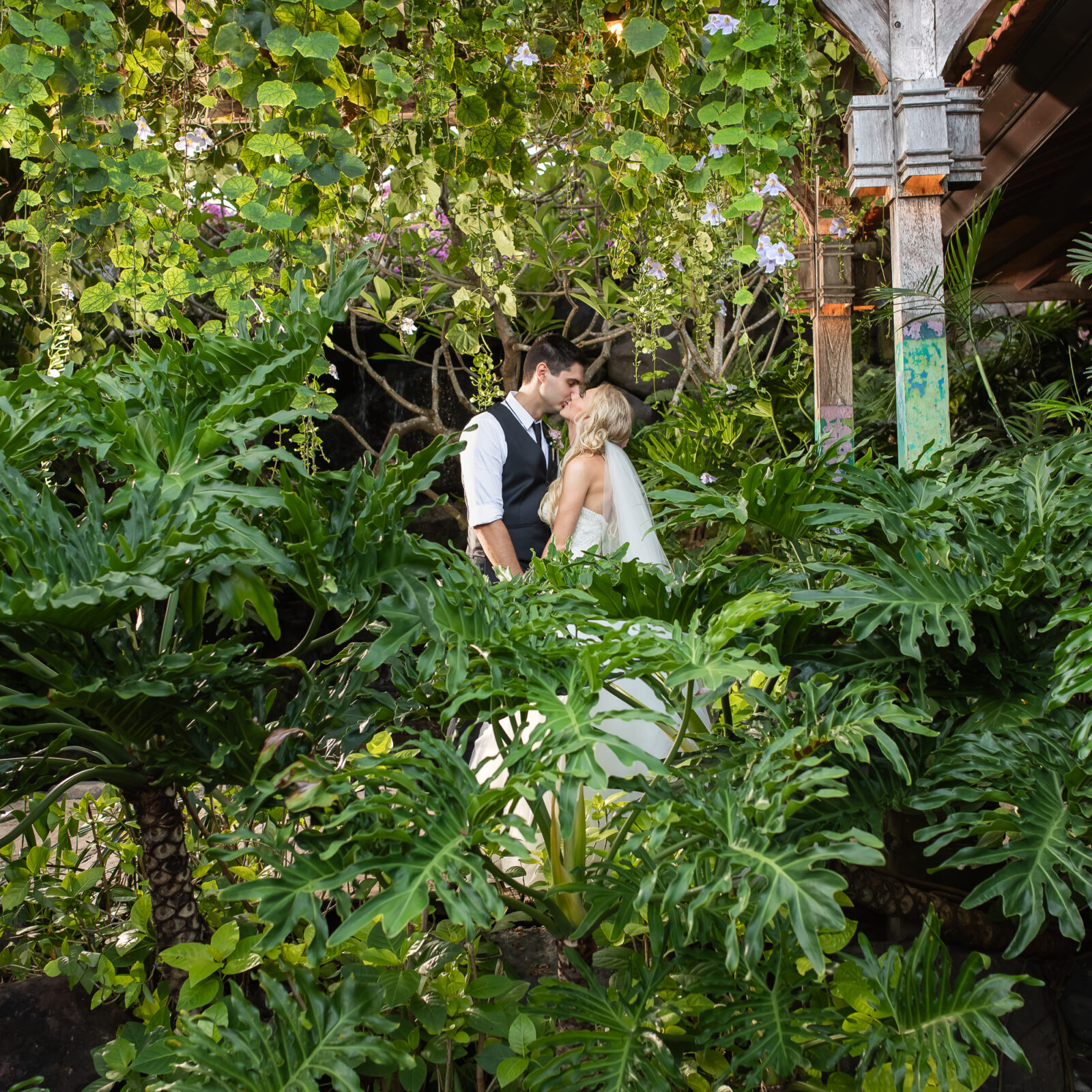 Taman Bhagawan Wedding - Couple portrait in the tropical garden