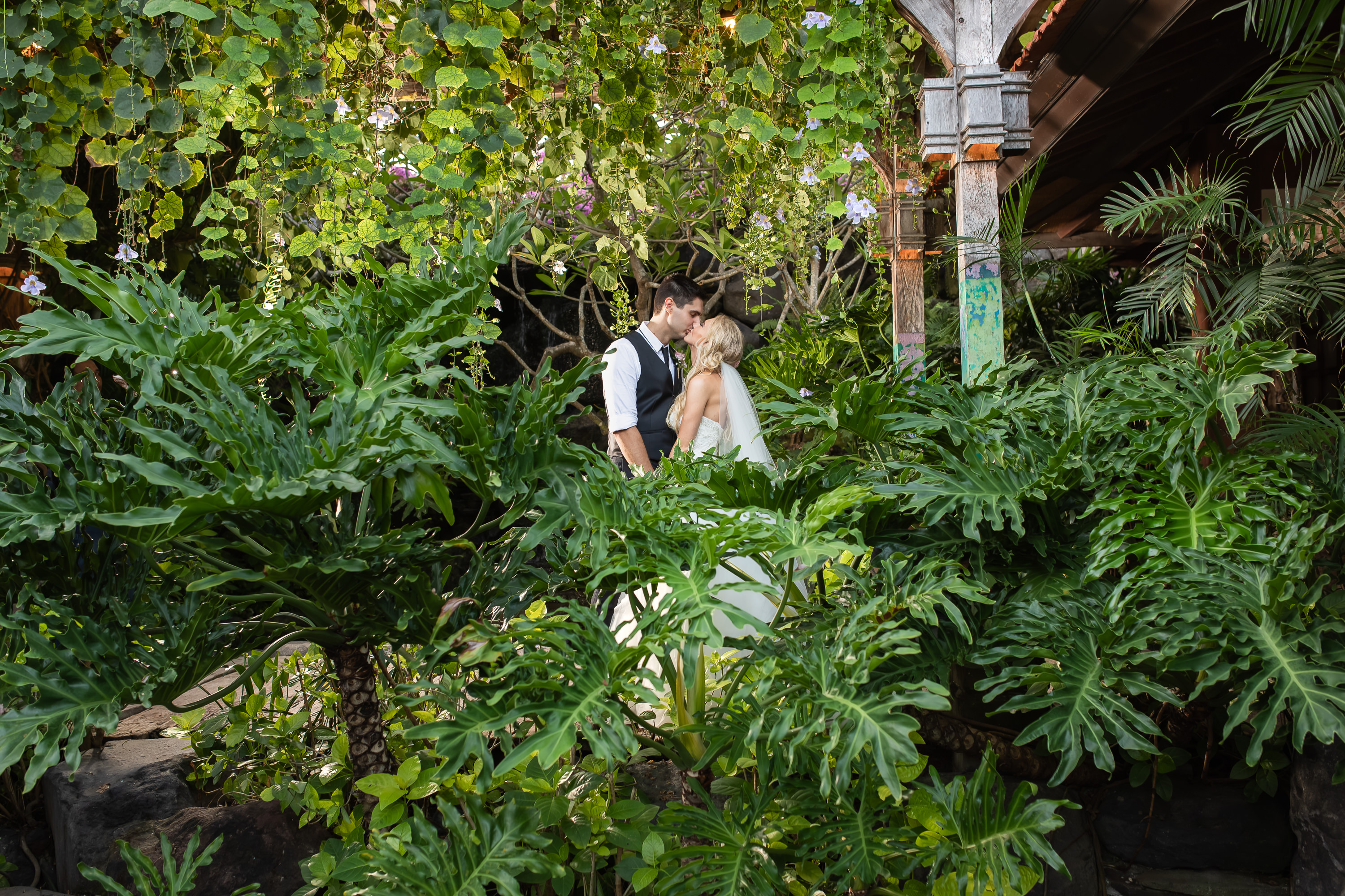 Taman Bhagawan Wedding - Couple portrait in the tropical garden
