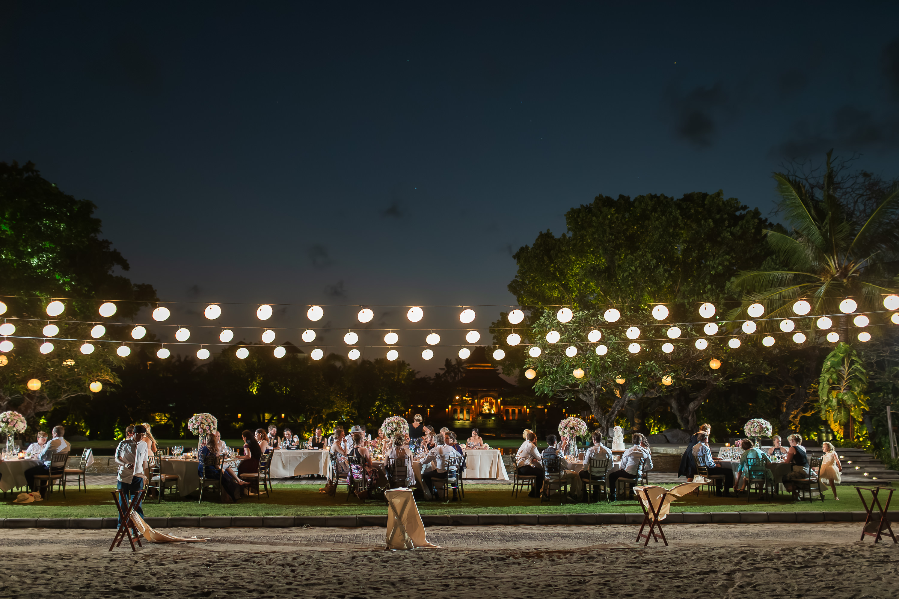 Taman Bhagawan Wedding - Wedding reception under string lights