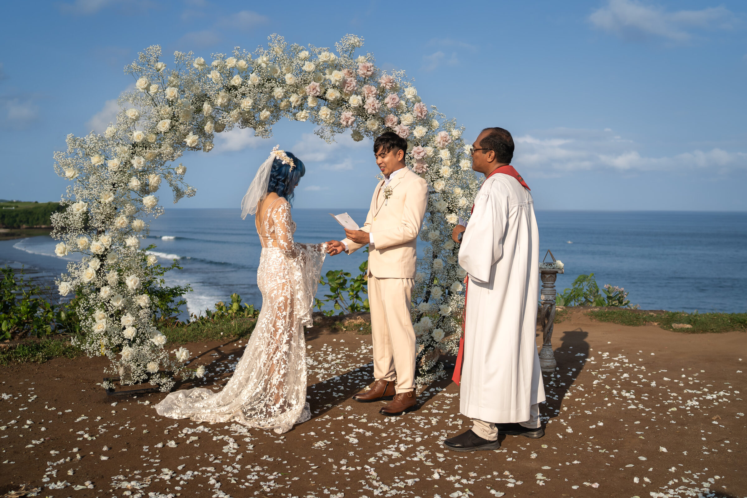Balangan Beach Weddings - flower arch vows