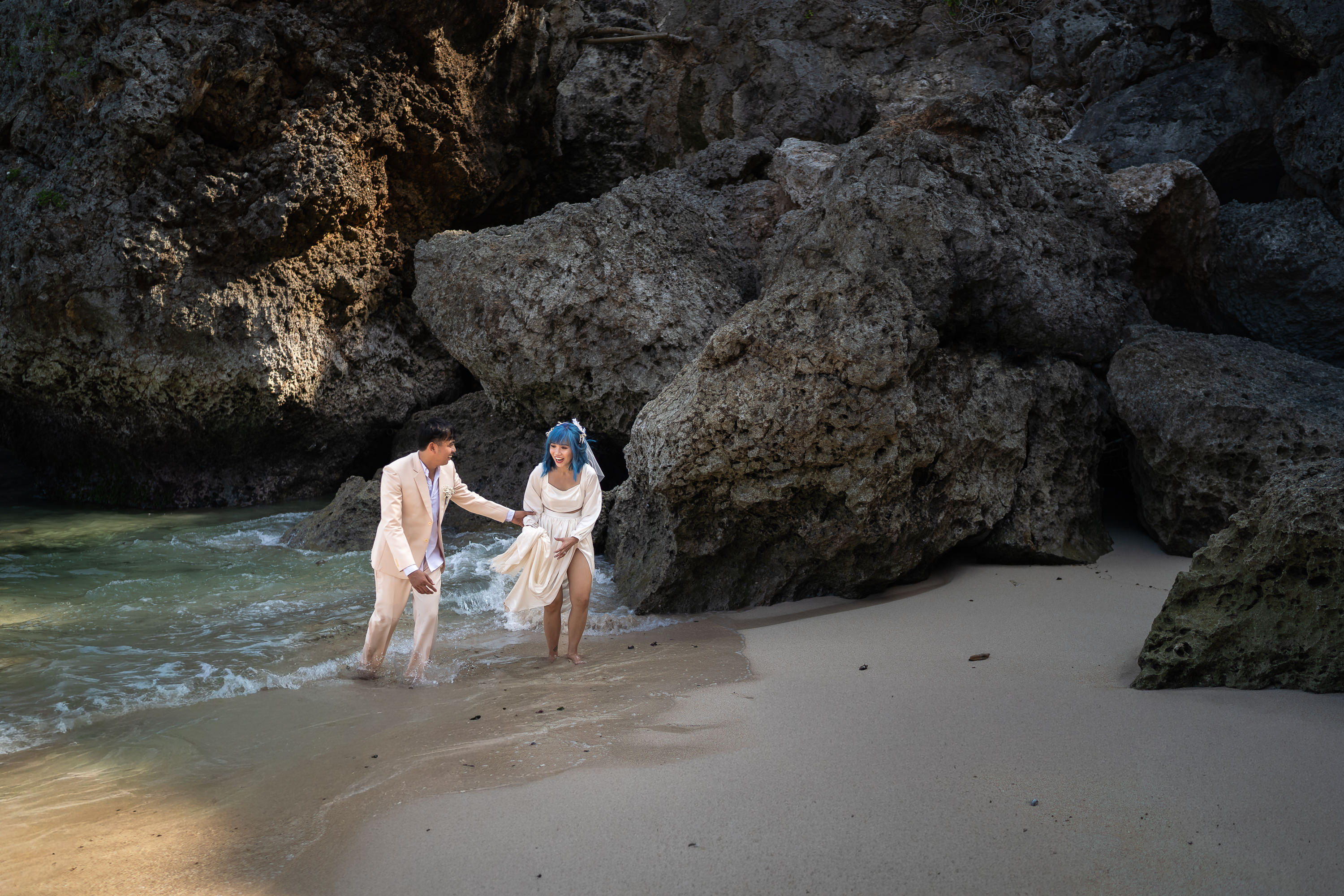 Balangan Beach Weddings - couple on rocks