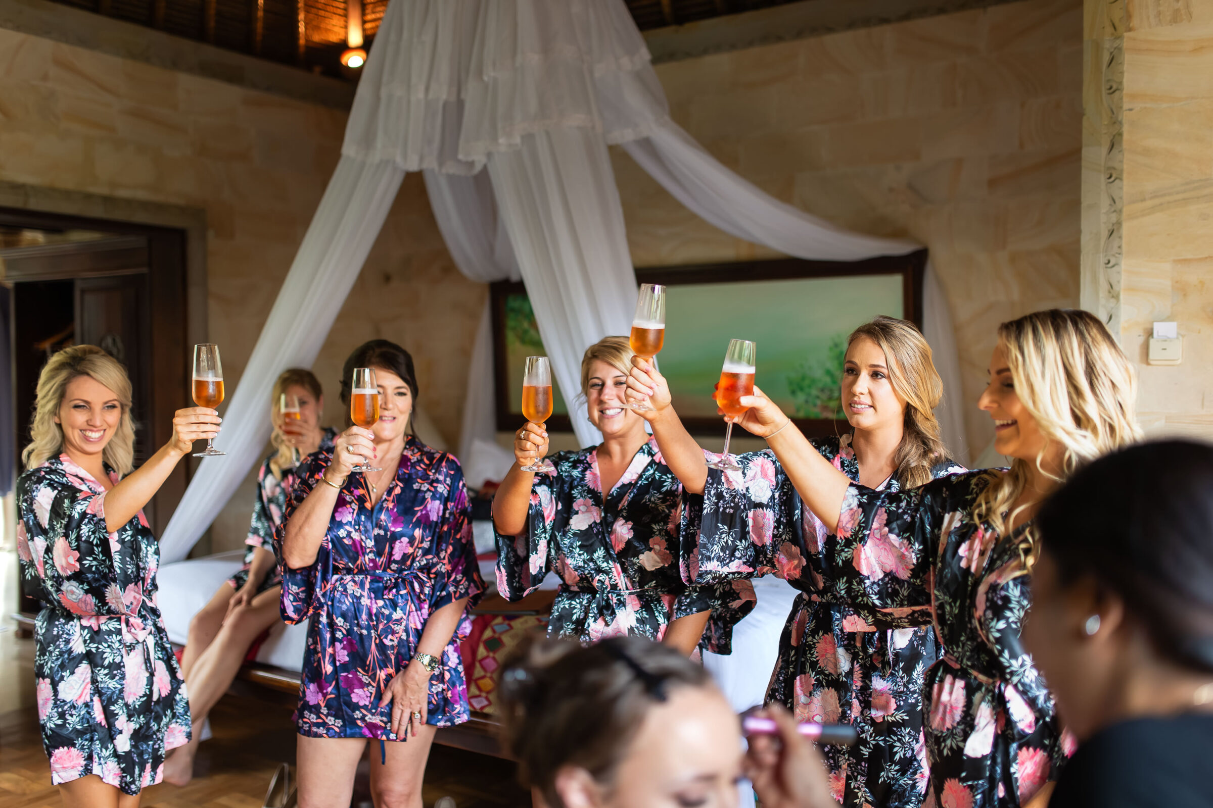 The Royal Pita Maha - bridesmaids toasting in robes
