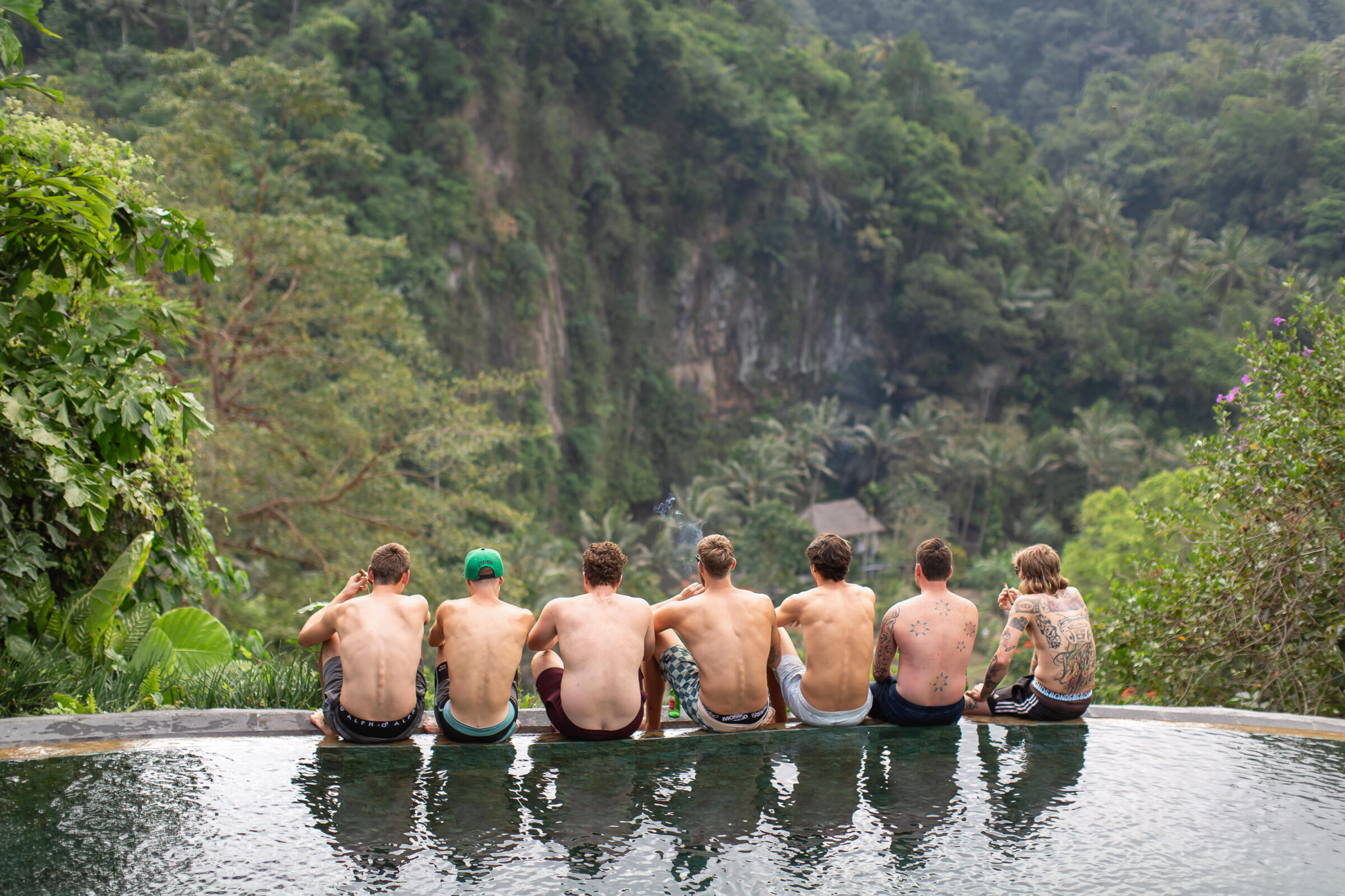 The Royal Pita Maha - groomsmen at the infinity pool