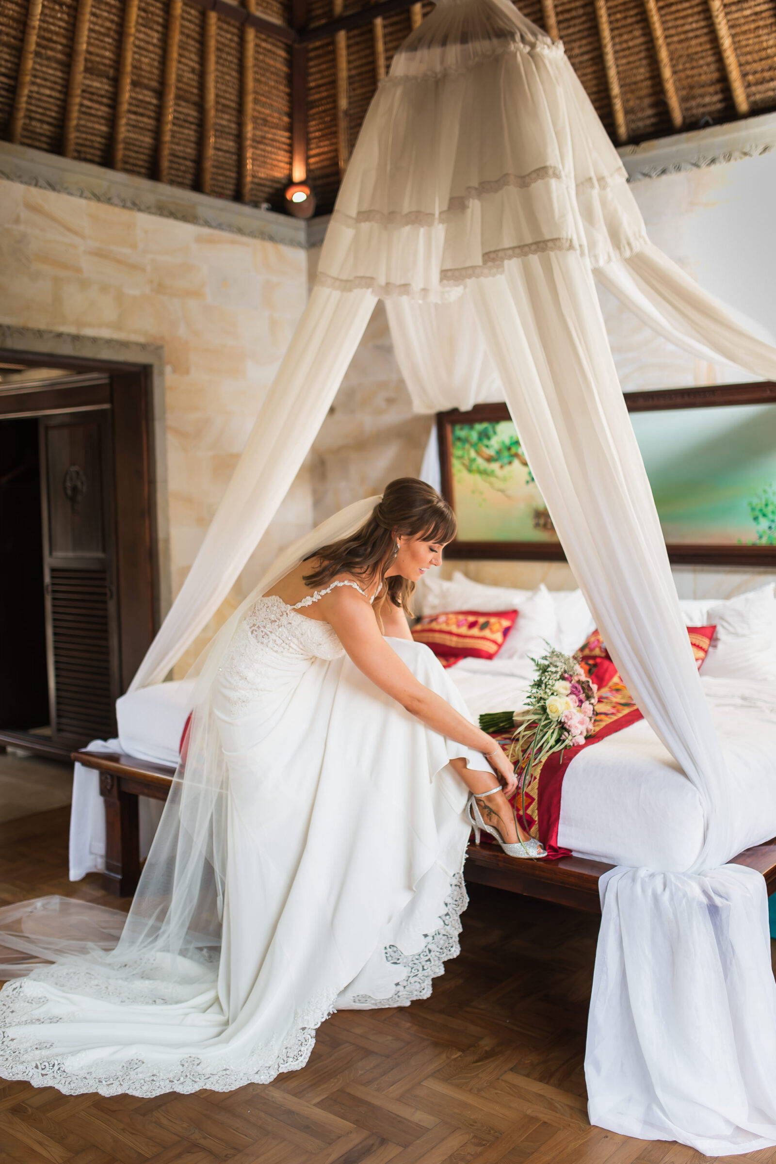 The Royal Pita Maha - bride on the bed in her wedding dress