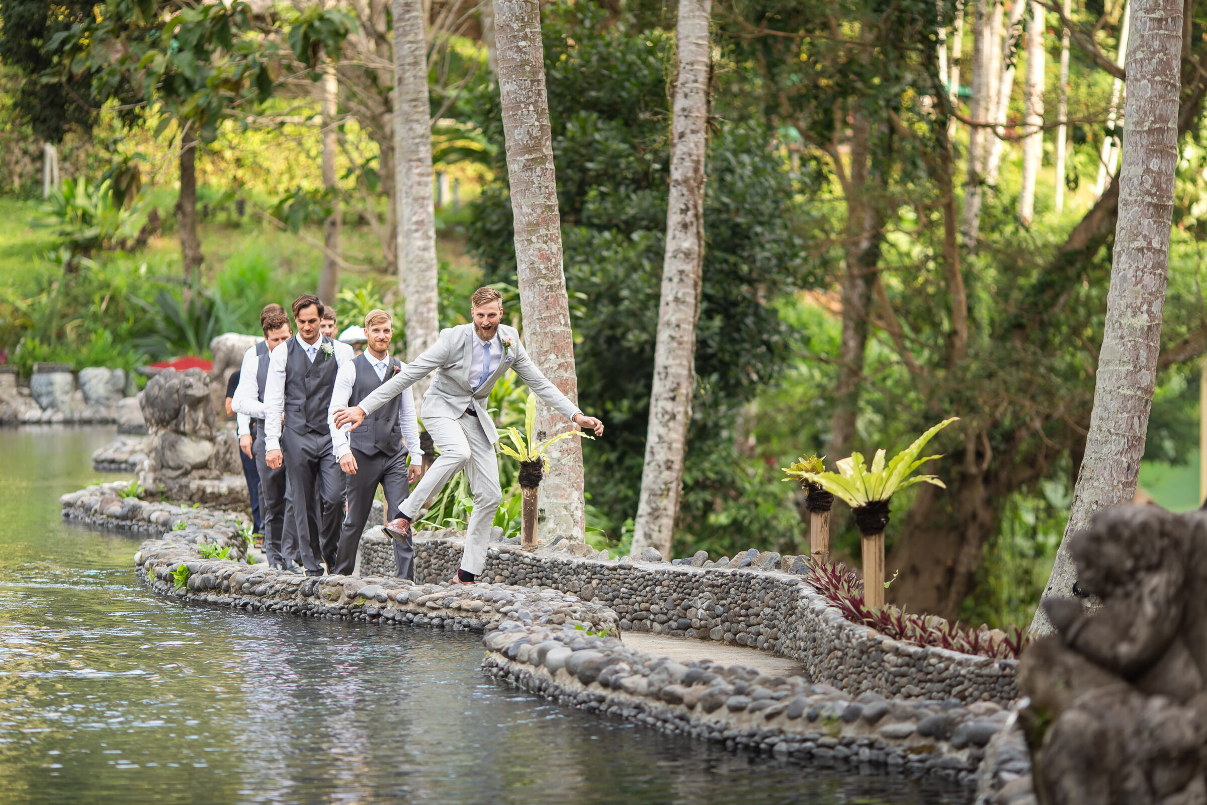 The Royal Pita Maha - groomsmen walking to the ceremony