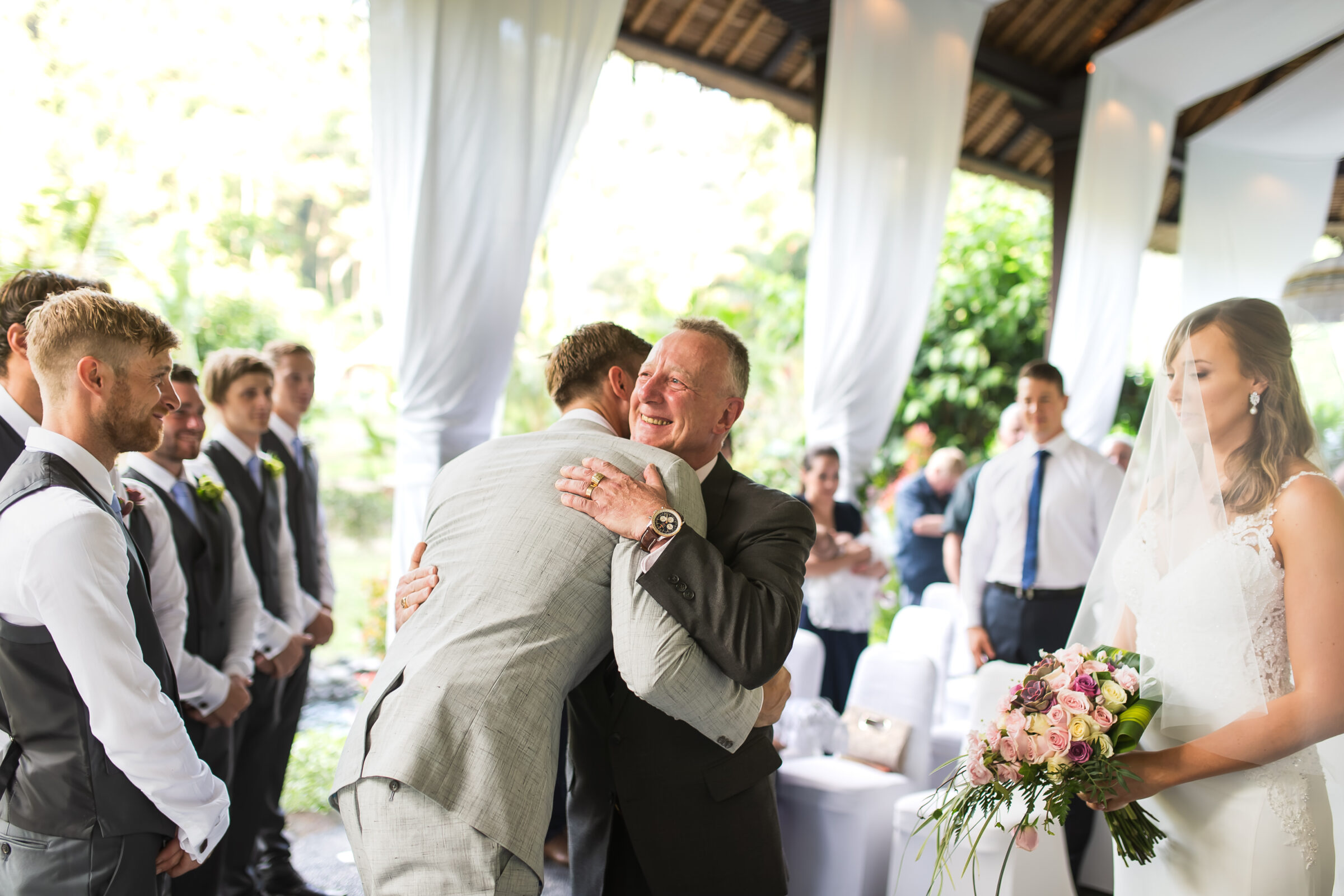 The Royal Pita Maha - groom hugging the bride's father